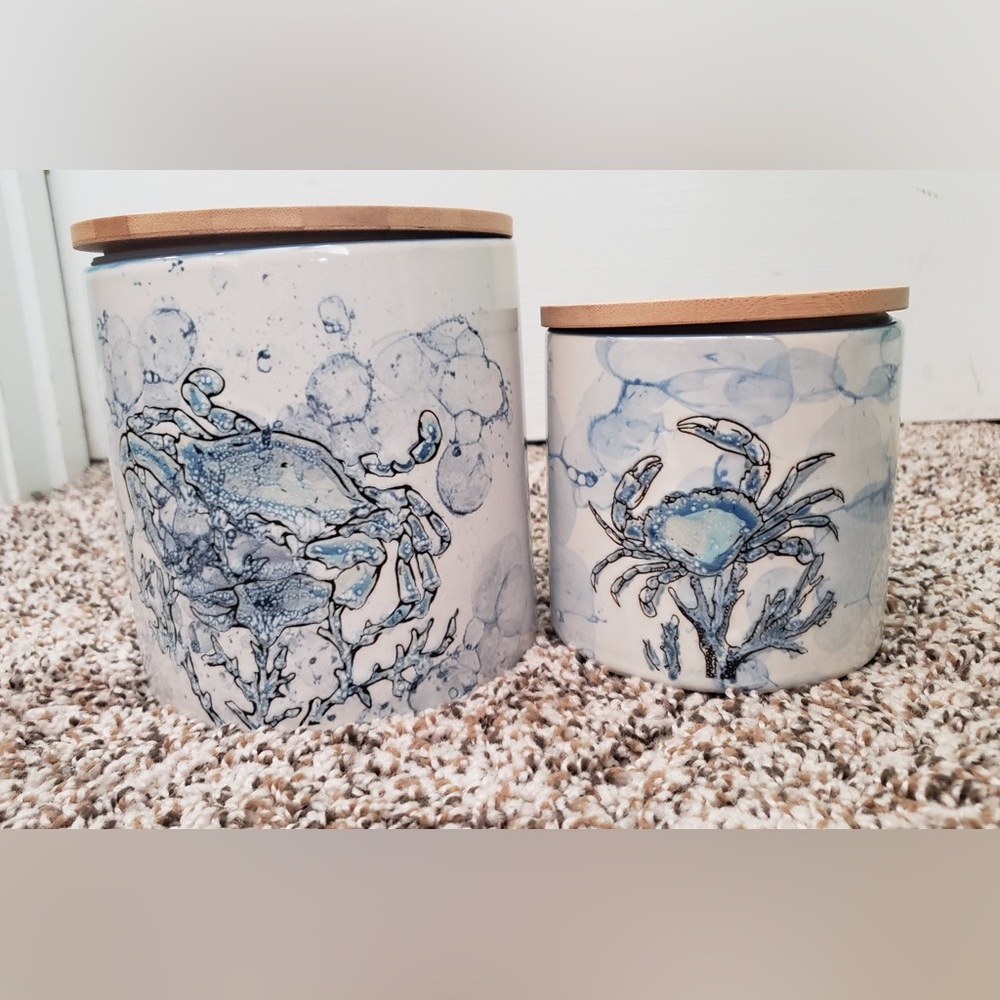 Canisters with crabs